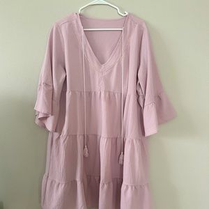 Pink tiered dress with tassels